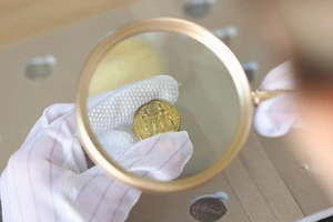 Le numismate Un...